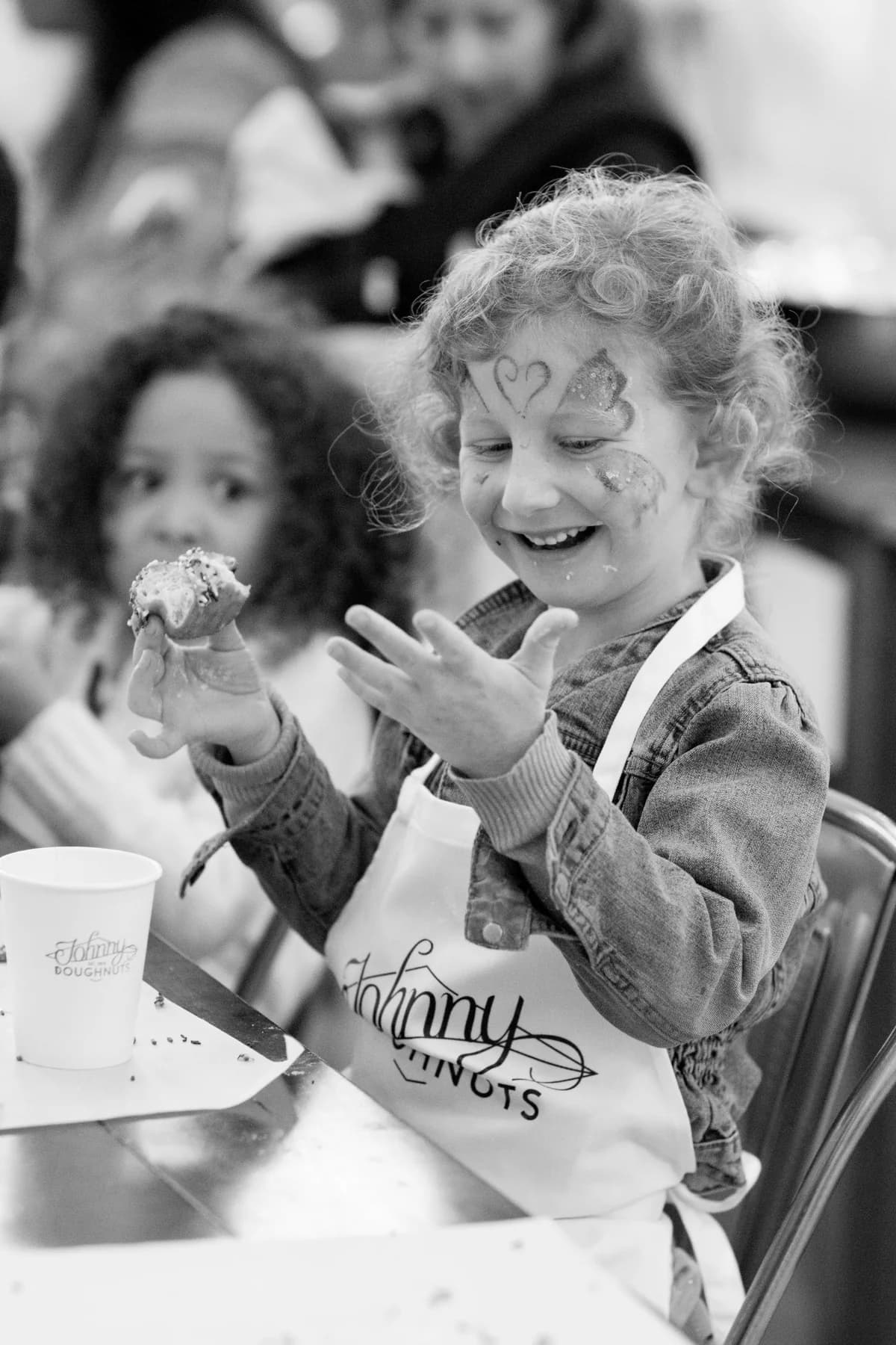 A family enjoying Johnny Doughnuts together.