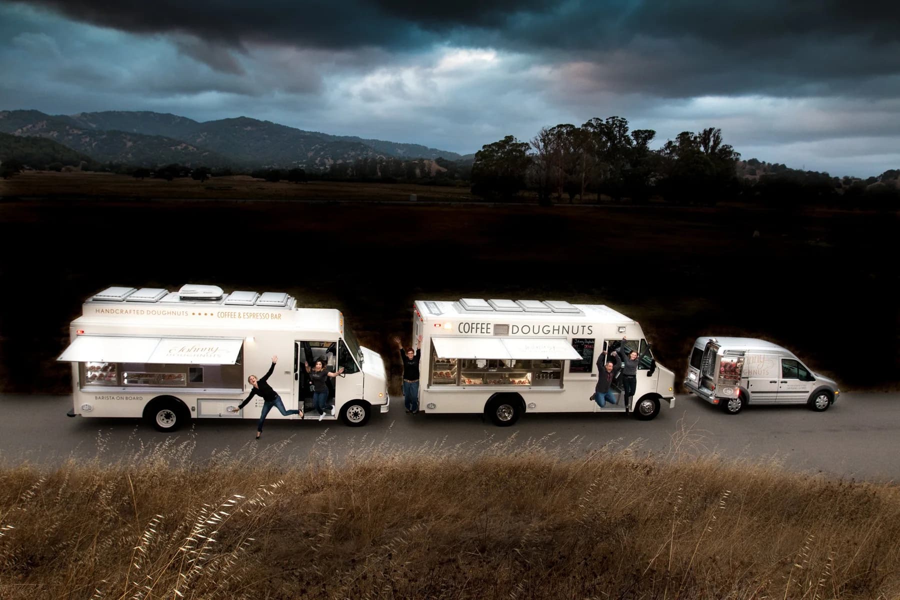 Johnny Doughnuts food trucks and delivery van.